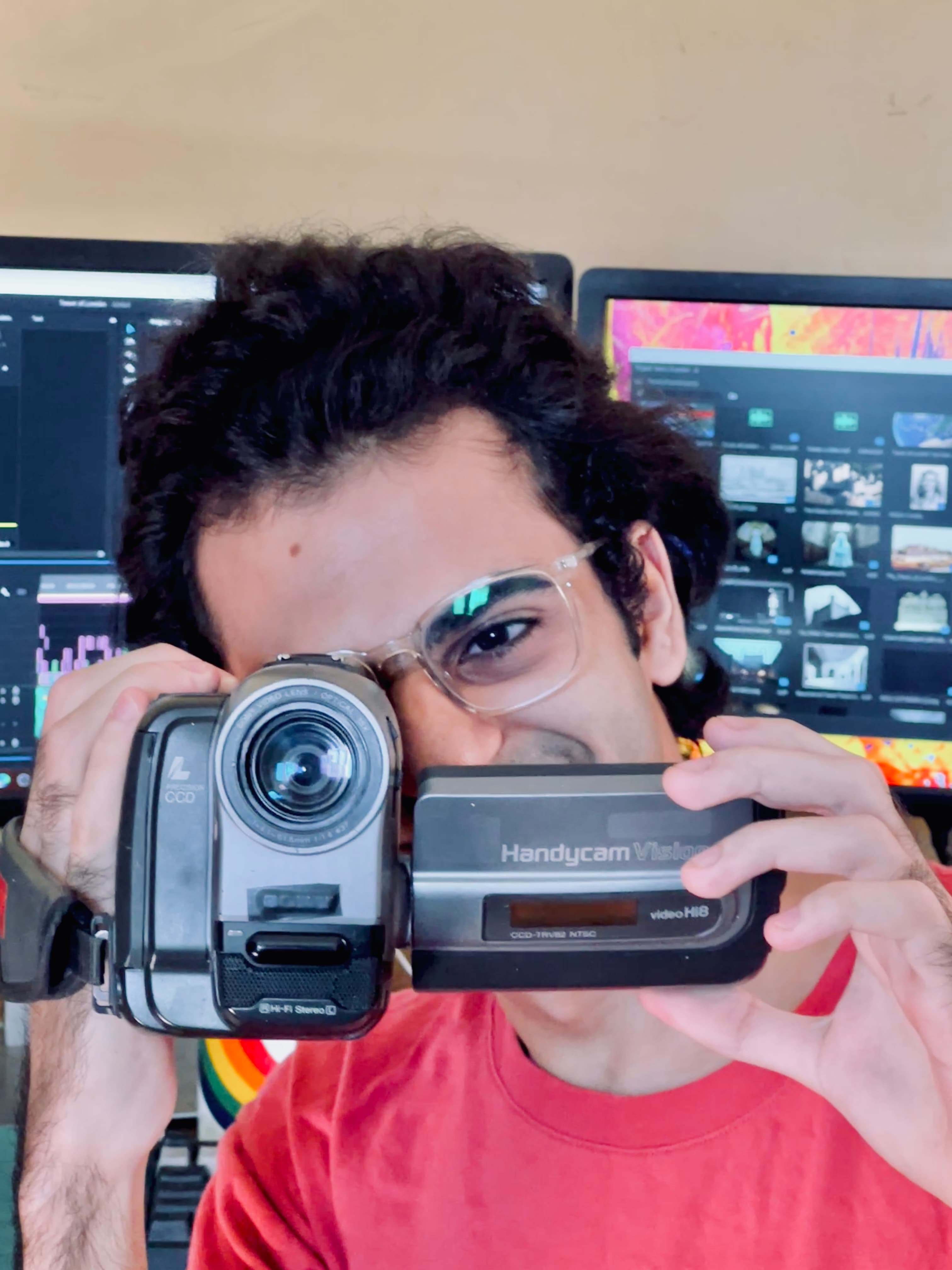 Ali holding a vintage Sony Handycam